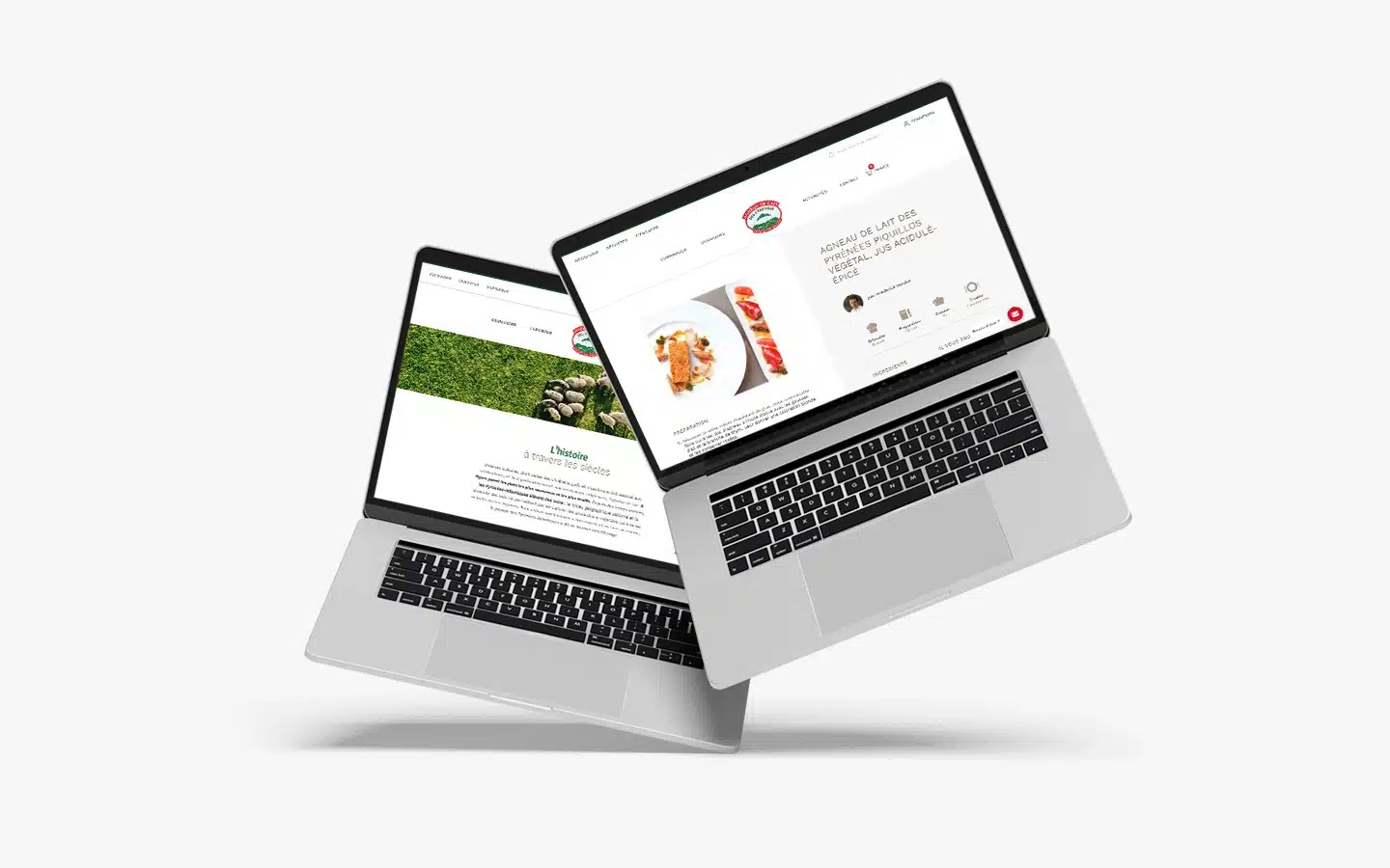 Deux ordinateurs de bureau affichant les interfaces web de la boutique en ligne de l'Agneau de lait des Pyrénées